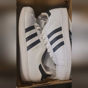 Classic black and white adidas. Like new hardly been worn